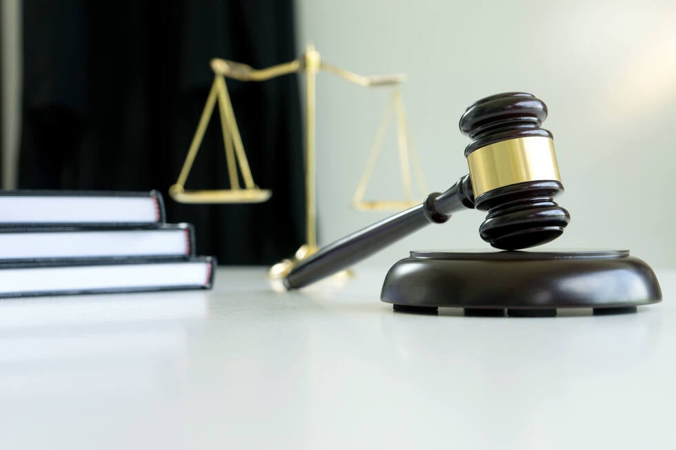 An attorney from Gallo Criminal Defense Las Vegas advising a client about potential felony or misdemeanor outcomes for larceny charges in Nevada.
