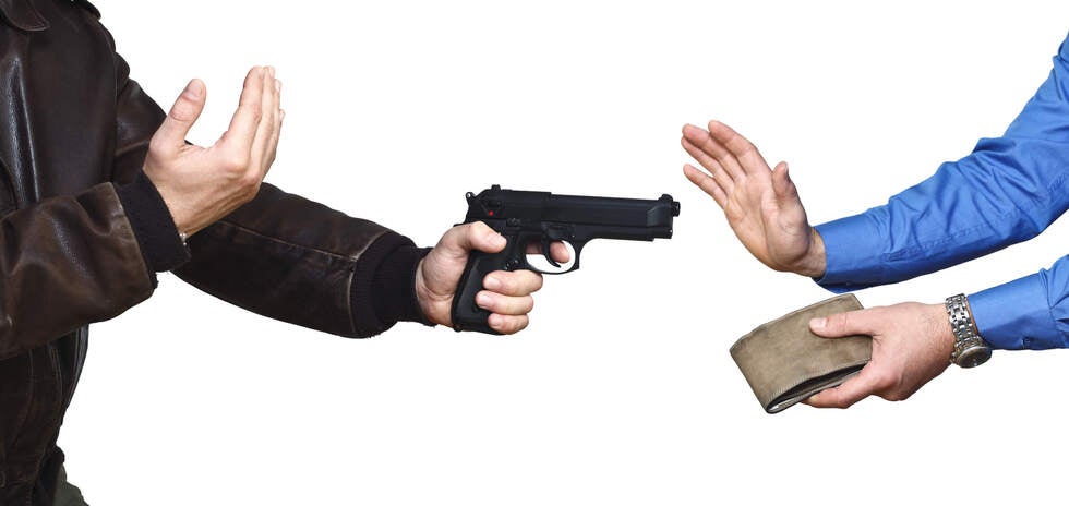 Experienced attorneys at Gallo Criminal Defense Las Vegas discussing the legal distinctions between burglary and robbery in a Las Vegas, NV courtroom.