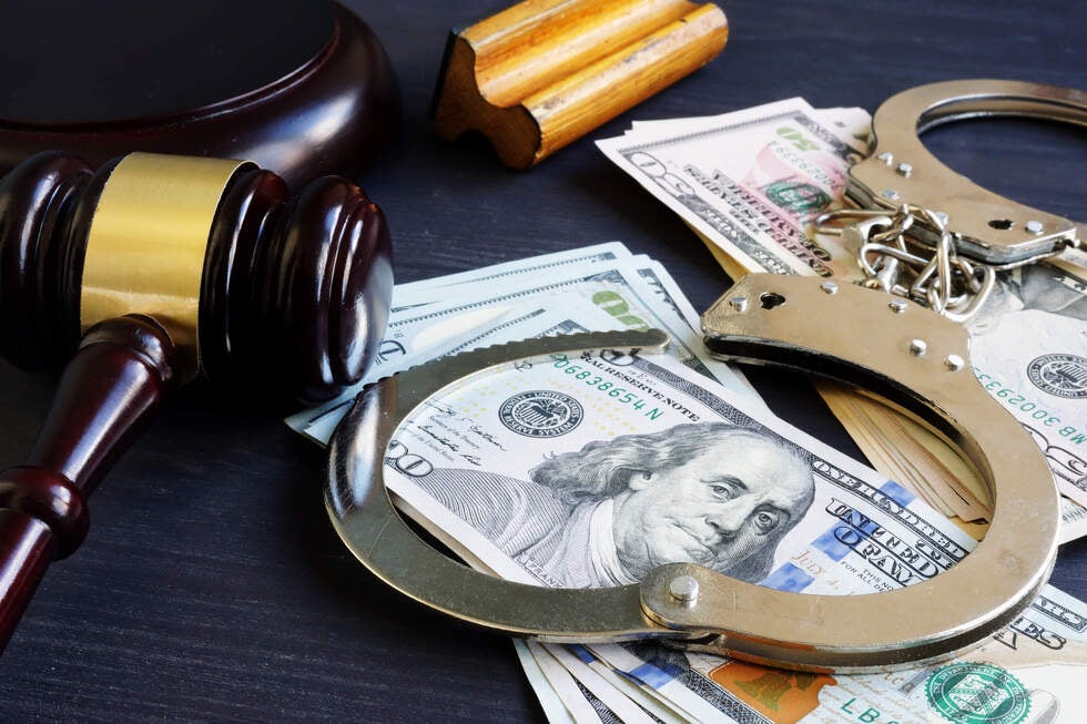 A person meets with a lawyer from Gallo Criminal Defense Las Vegas to discuss what happens after being unable to afford bail in Las Vegas, Nevada.