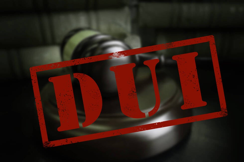 Attorney from Gallo Criminal Defense Las Vegas reviewing DUI case files in Las Vegas Nevada courtroom