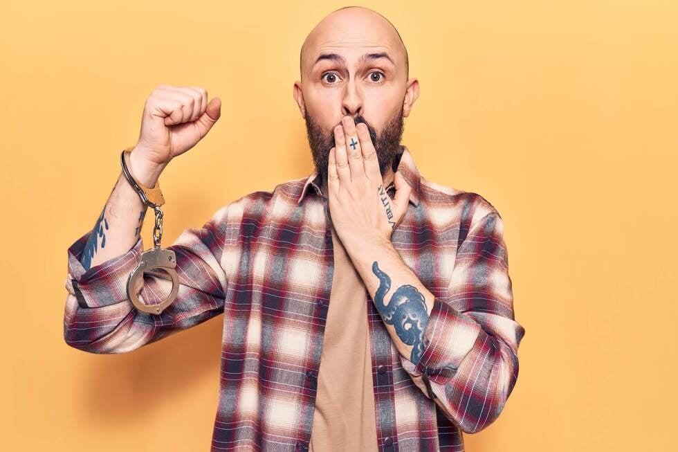 A professional criminal defense attorney from Gallo Criminal Defense Las Vegas provides a legal consultation to a client regarding common mistakes to avoid after an arrest in Las Vegas Nevada.