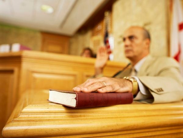 Man with Bible in court