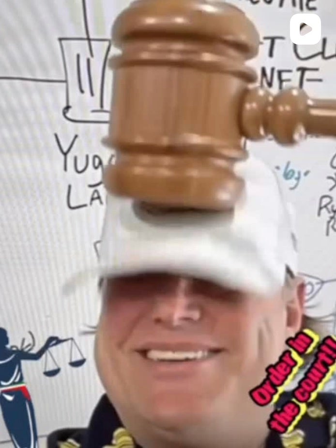 large gavel smashing head