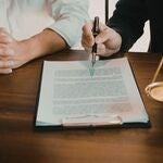 A client consulting with a lawyer.