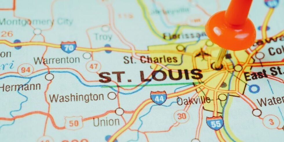 A map of St. Louis with a pin in it.