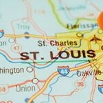 A map of St. Louis with a pin in it.