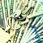 Car keys sitting on money
