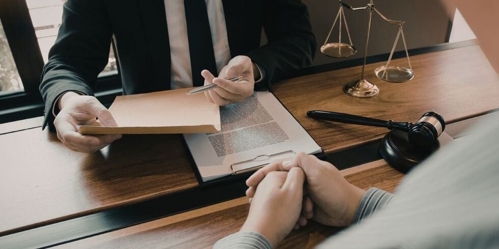 A man consulting with a lawyer