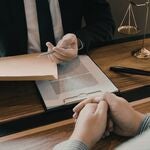 A man consulting with a lawyer