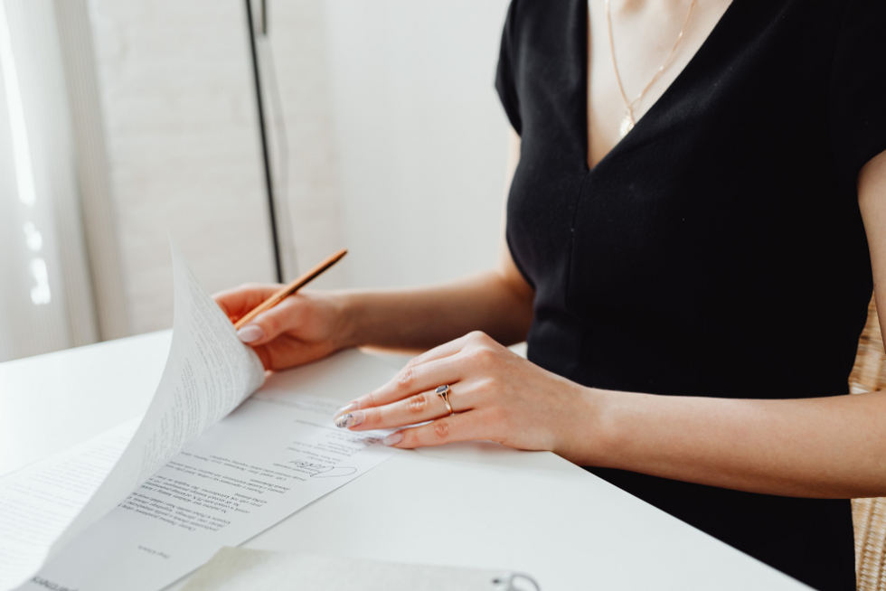 woman reviewing power of attorney papers