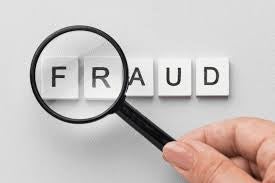 Fraud Investigation Concept - Magnifying Glass Over Word FRAUD - Business Litigation Attorney Miami Beach Florida