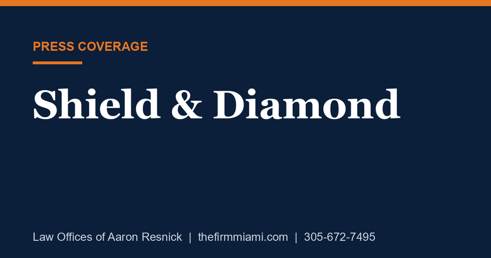 Shield & Diamond press card