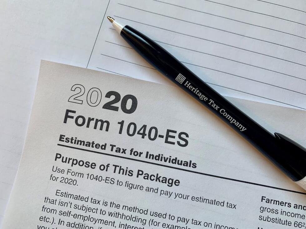 stack of IRS tax forms related to stock options - employee stock option attorney