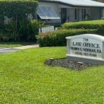 Exterior of the Law Office of Shawn C. Newman with monument sign