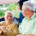 elderly couple and a nurse