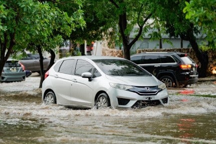car accident caused by flooding