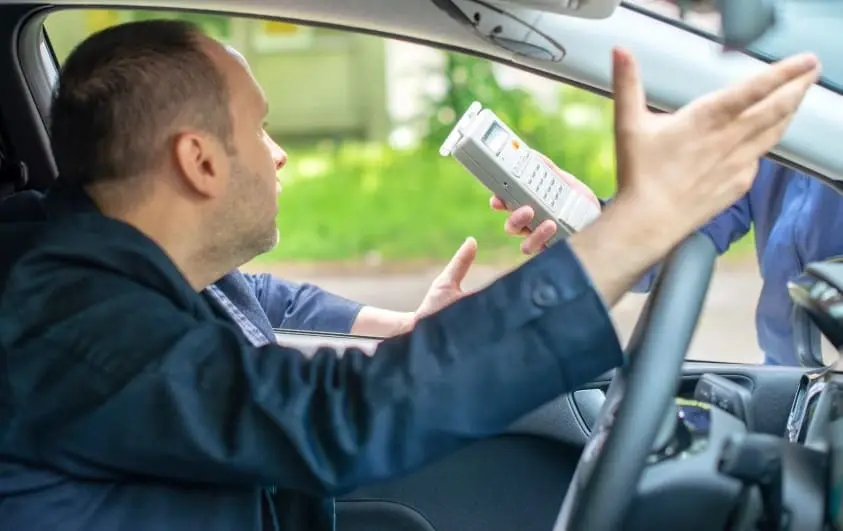 Driver refusing a roadside breathalyzer test during New Jersey traffic stop for suspected DWI