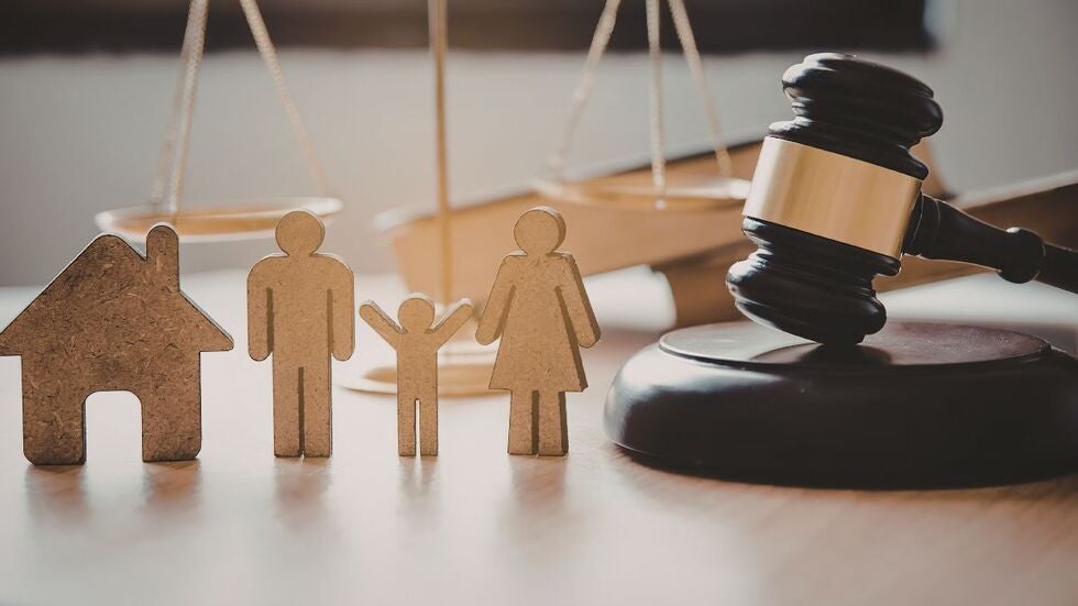 Segarra Law Firm family law image showing a house, parents, child, and judge’s gavel, representing parenting agreements in Miami.