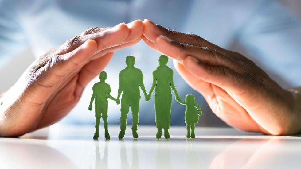 Segarra Law Firm image of hands protecting a family figure display, symbolizing parenting agreements, child-focused planning, and legal support in Miami.