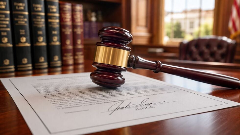 Judge’s gavel resting on a signed legal document in a professional Florida law office.