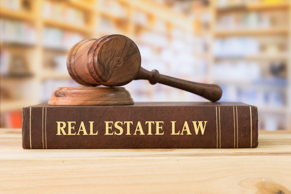 Real estate law on book