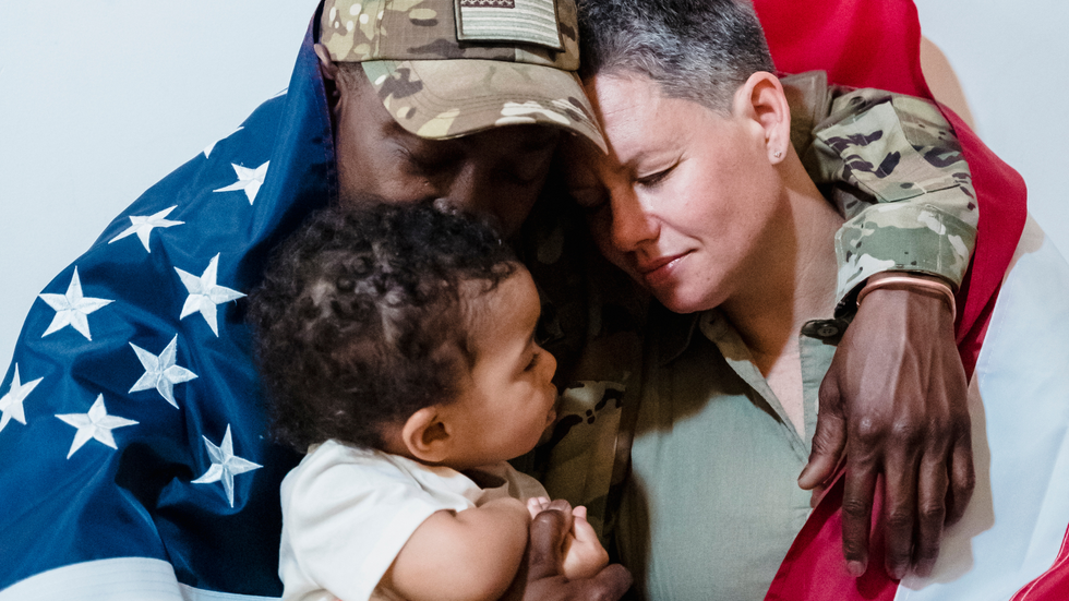 A Veteran hugging his family