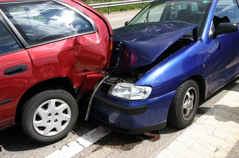 Rear-end car accident in Union City, NJ with two damaged vehicles after collision