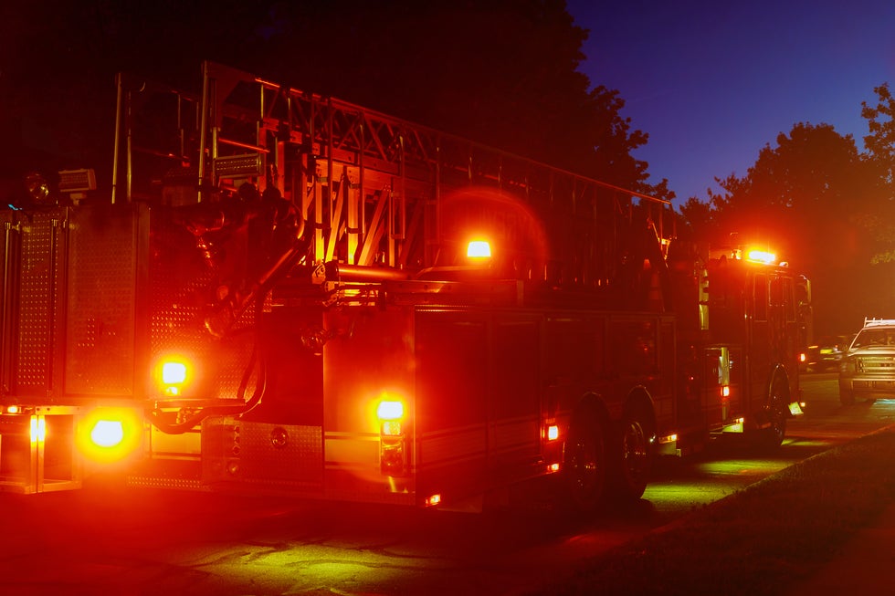 Fire truck responding to nighttime crash on NJ Turnpike in Mercer County after truck accident with serious injuries