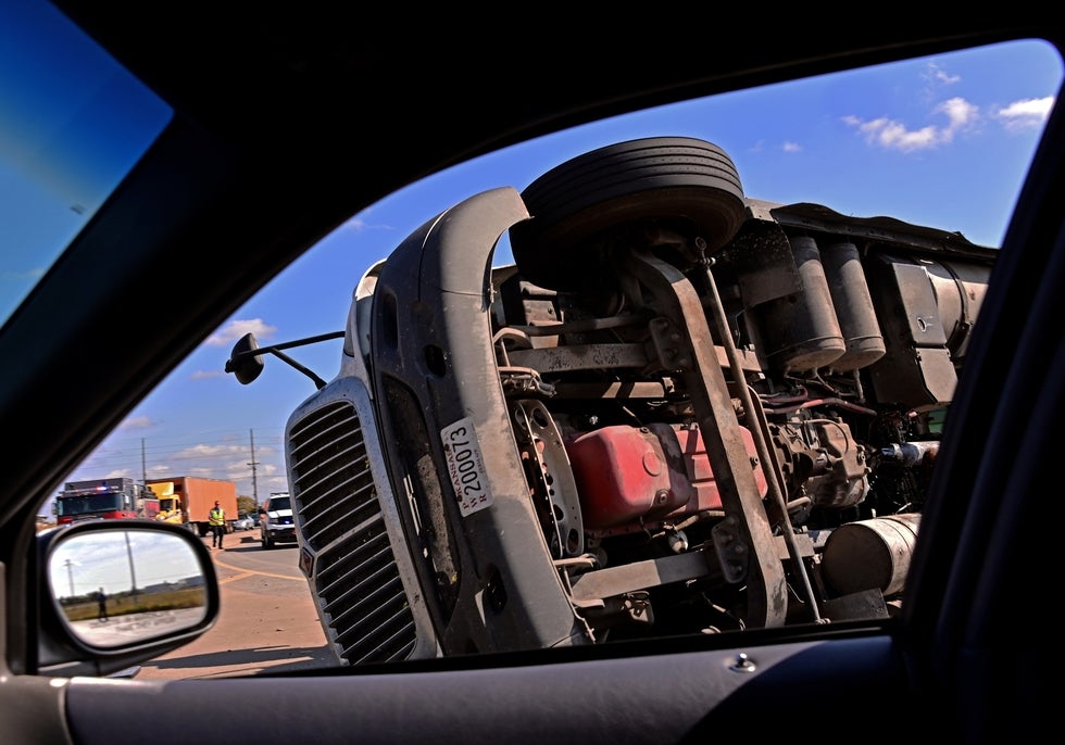 Overturned dump truck accident on Route 17 in Paramus New Jersey with emergency response on scene