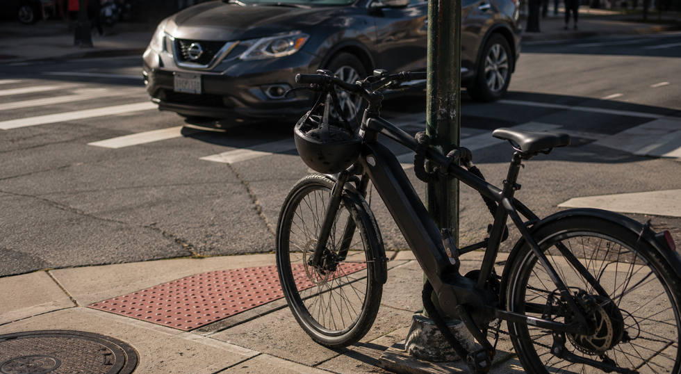 Electric bike with helmet at a New Jersey intersection under the state’s new 2026 e-bike safety laws.