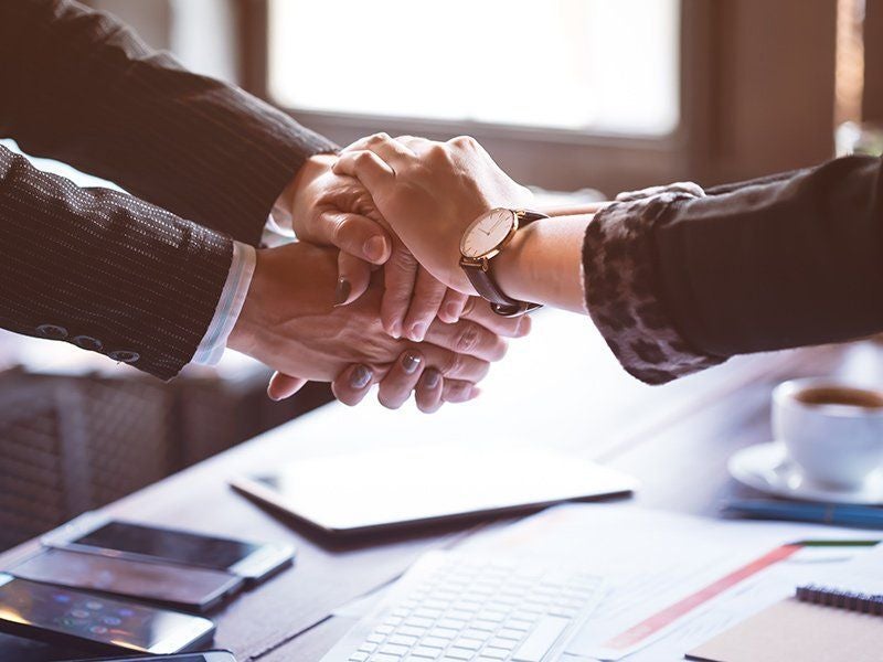lawyer and client shaking hands