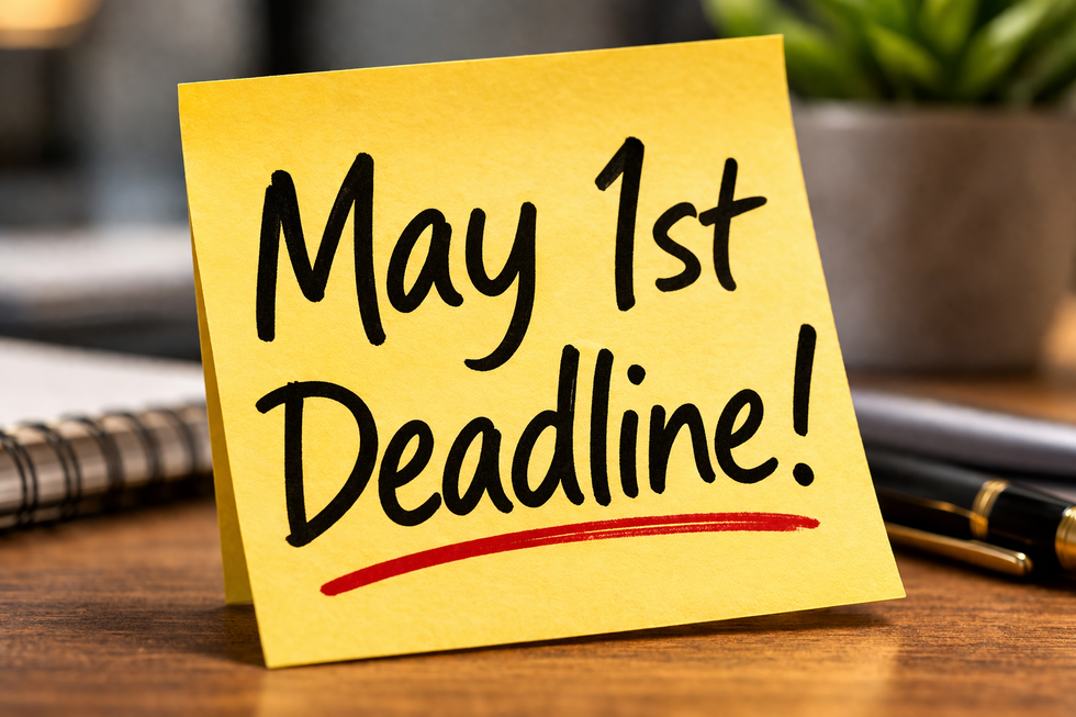 Desk calendar with May 1 highlighted as the Florida annual report filing deadline