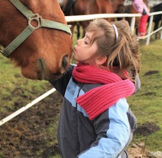 girl kissing horse