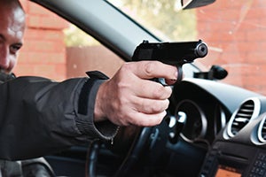 California Penal Code § 247(b) PC: Shooting at an Unoccupied Motor Vehicle or Uninhabited Structure