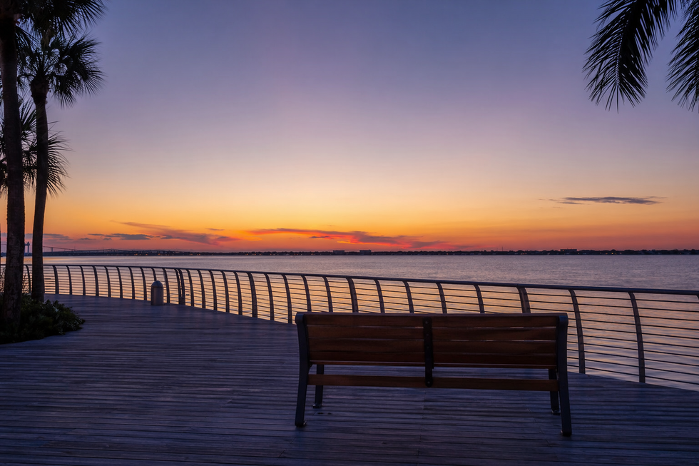 Empty bench overlooking Charlotte Harbor in Punta Gorda, Florida, where families face probate without a will
