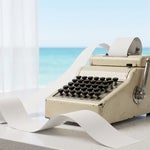 Vintage adding machine with a blank paper tape on a Marco Island kitchen counter, representing adding up the cost of probate in Florida