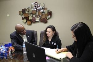 Attorney Mark Nicholson with a client