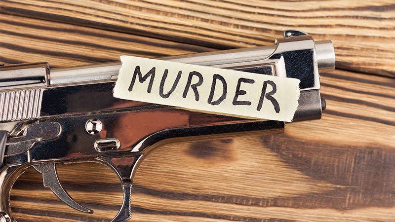 Handgun with Murder tag on it