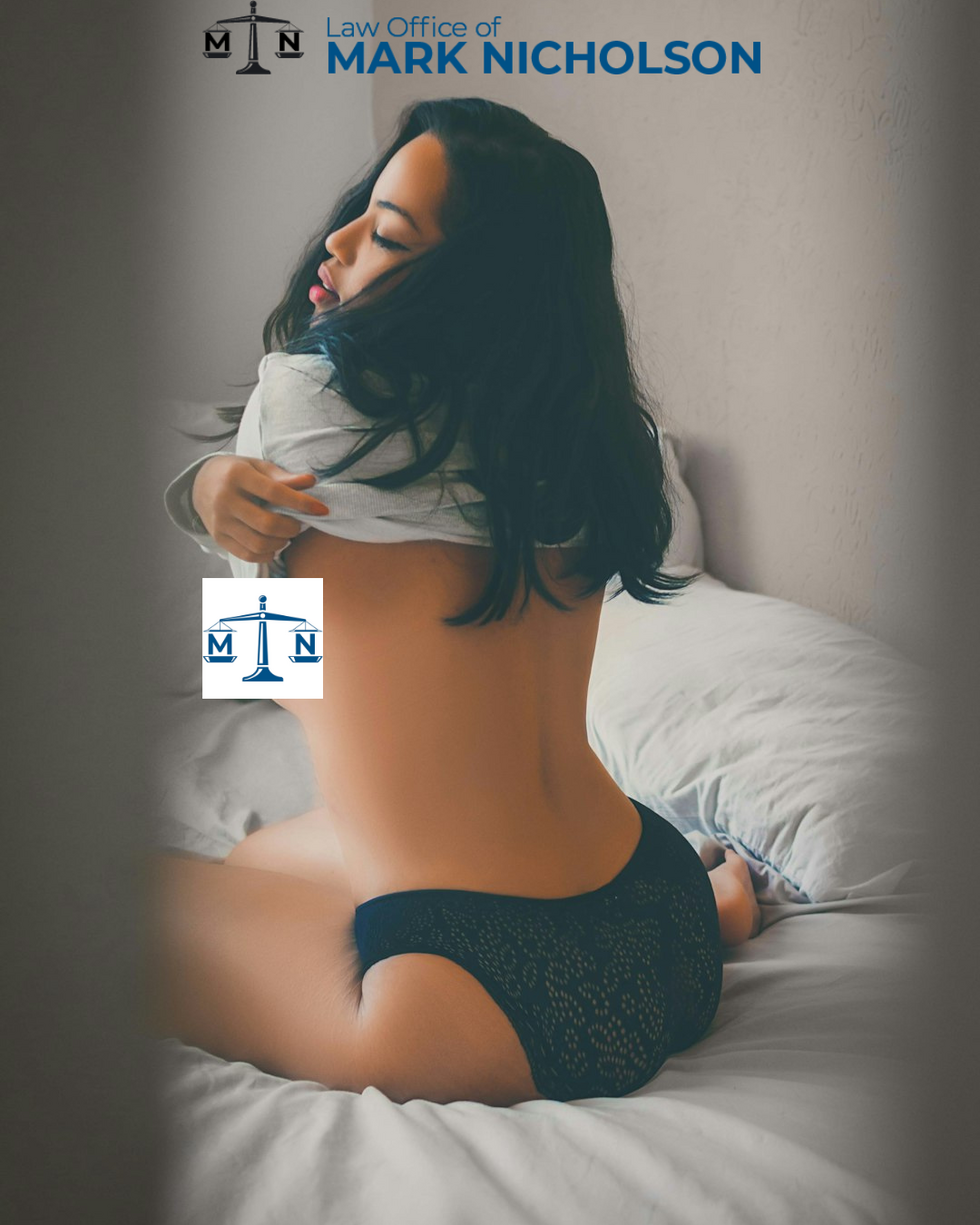 Woman taking of her shirt