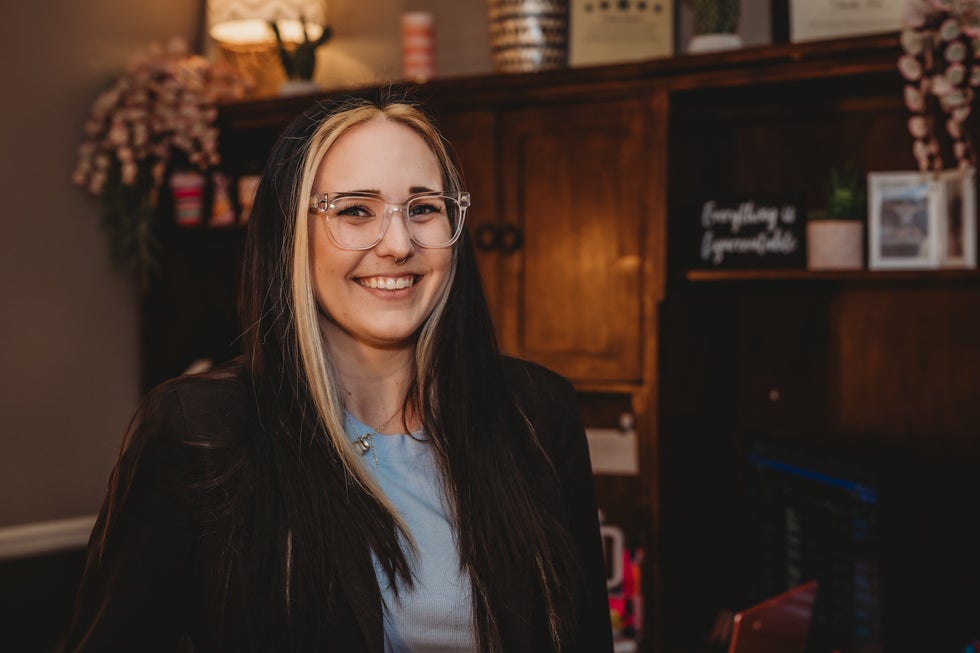 Portrait of Chandler Johnson, Paralegal to Attorney Megan Metzinger at Higher Level Legal in Raymore, Missouri