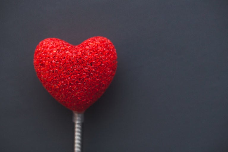 Decorative heart on a stand.