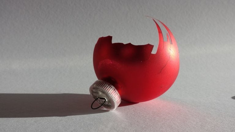 Broken red Christmas tree ornament.