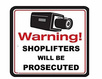 Sign that says Warning! Shoplifters will be prosecuted